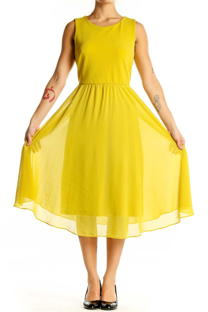 Front view of Shelby & Palmer yellow sleeveless midi dress with A-line silhouette