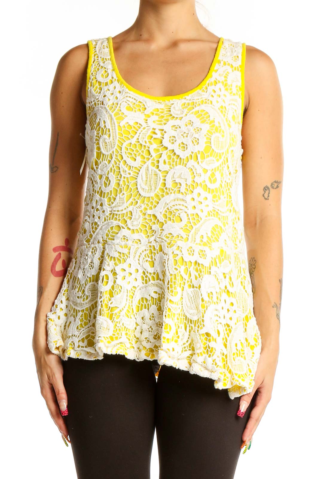 Front view of Meadow Rue Yellow Floral Lace Peplum Tank Top with white lace overlay