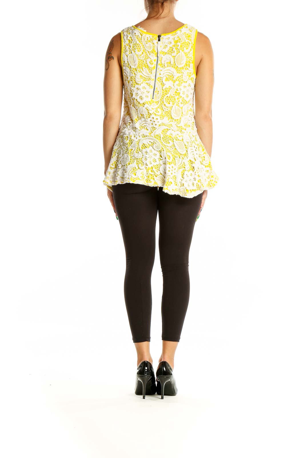 Back view of Meadow Rue Yellow Floral Lace Peplum Tank Top showing exposed zipper