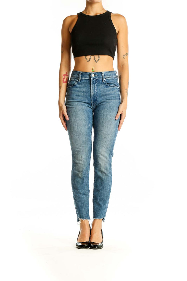 Front view of Mother blue high-rise skinny jeans with raw hem