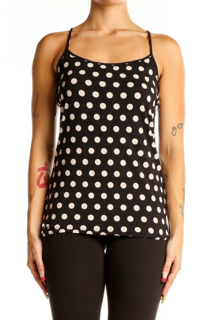 Front view of LOFT black and white polka dot camisole