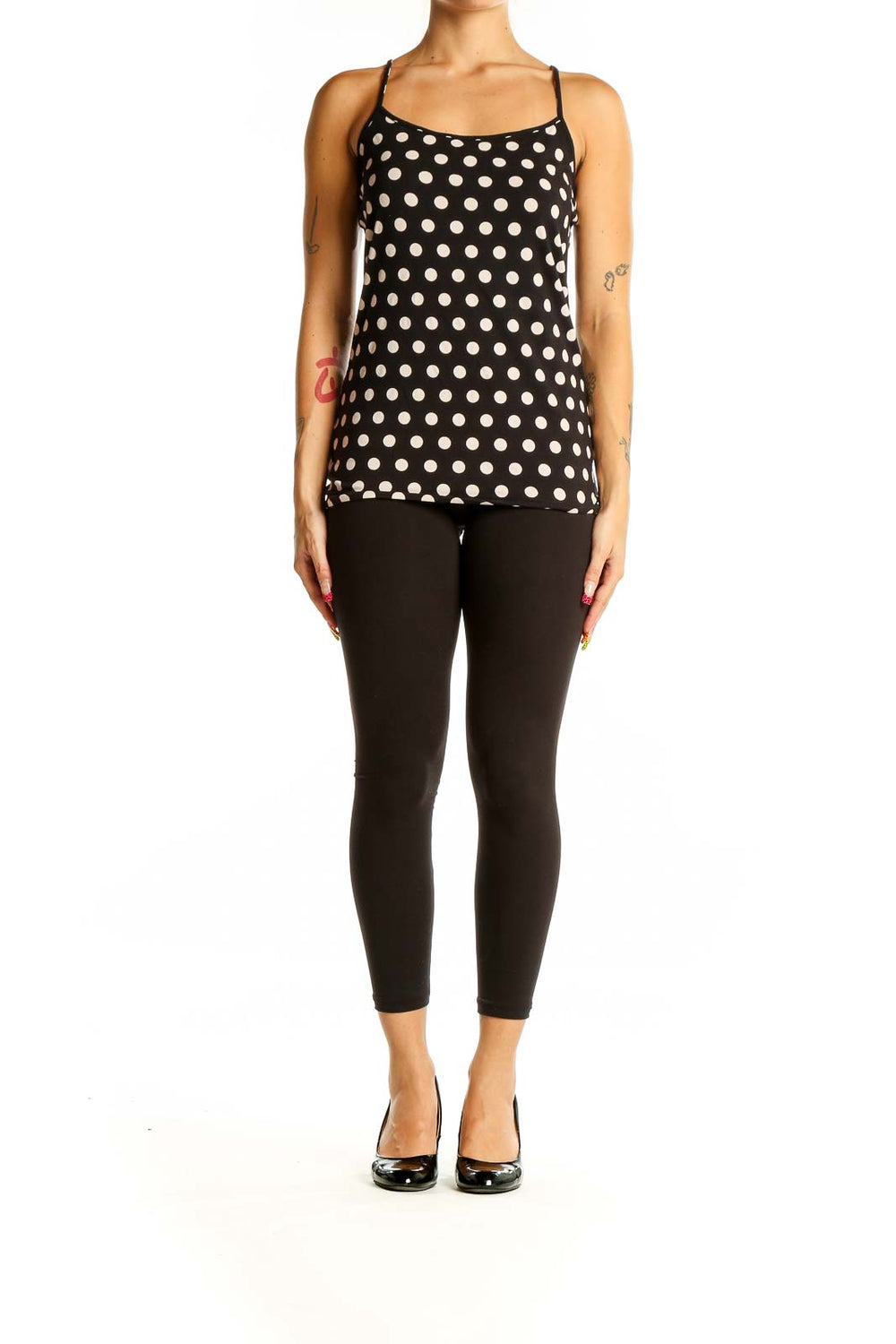 Front view of LOFT black and white polka dot camisole