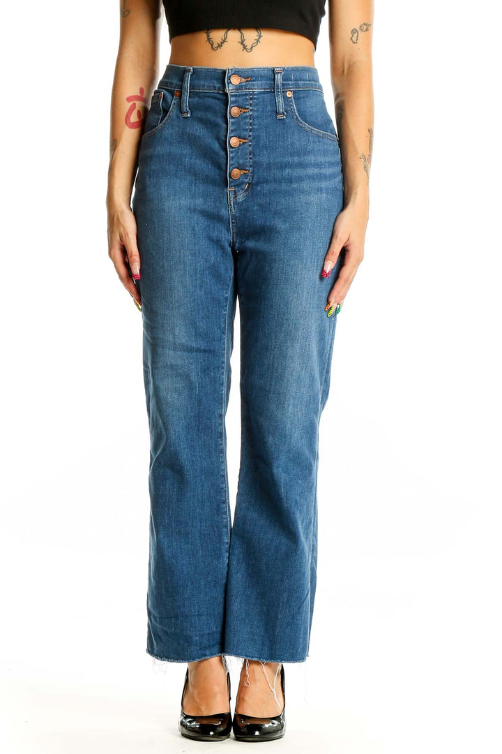 Front view of Madewell blue high-waisted wide-leg jeans with button-fly