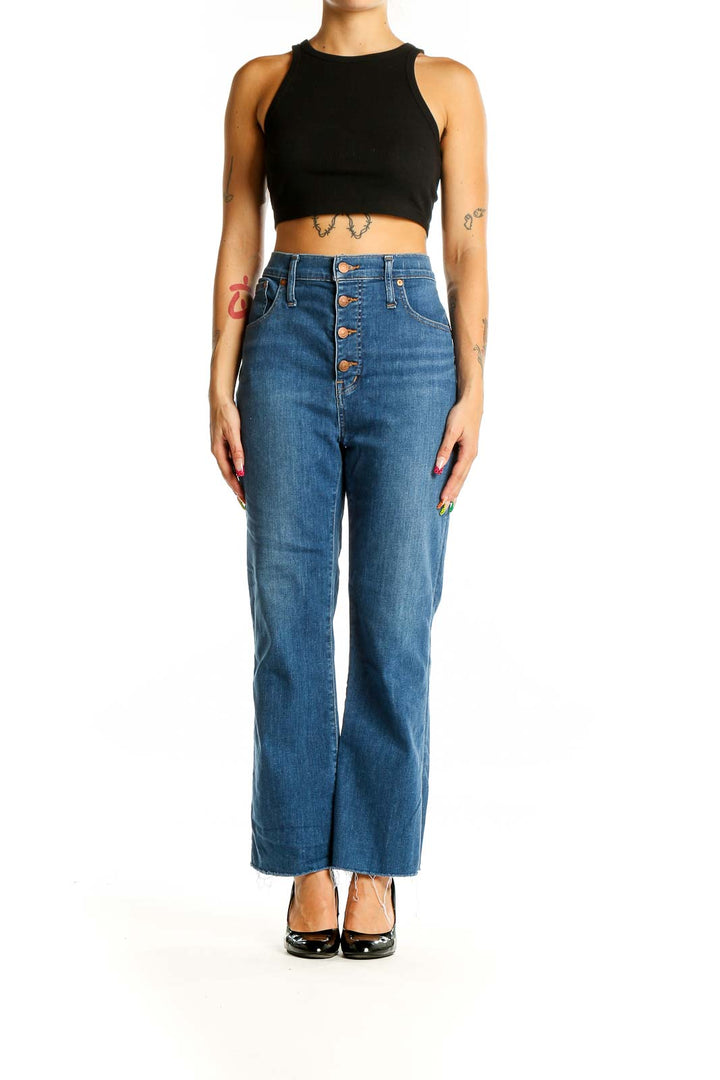 Front view of Madewell blue high-waisted wide-leg jeans with button-fly