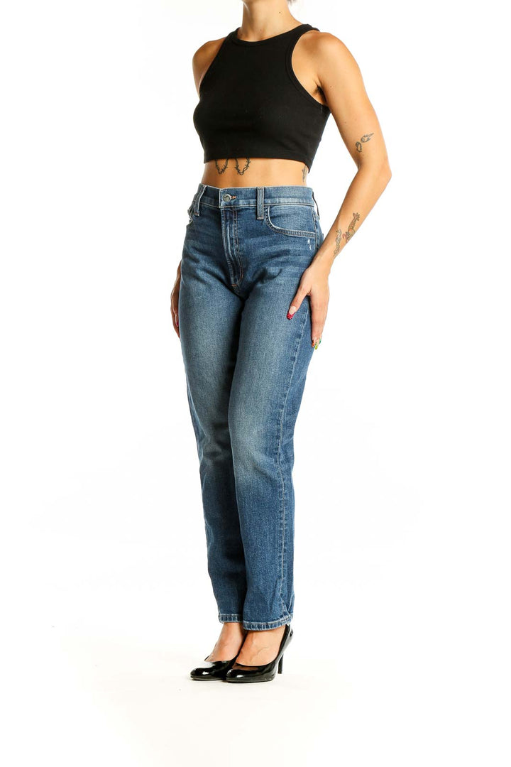 Front view of Joe's blue straight leg jeans on model