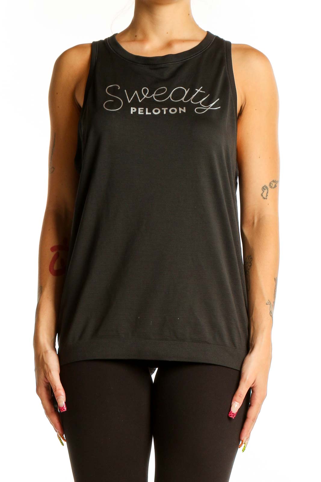 Front view of black Lululemon x Peloton sleeveless tank top with 'Sweaty' graphic