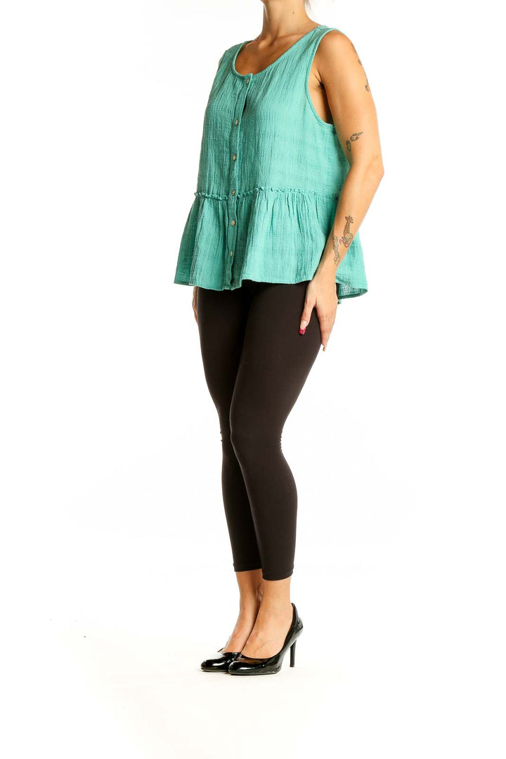 Front view of mint Sigrid Olsen button-front peplum tank top