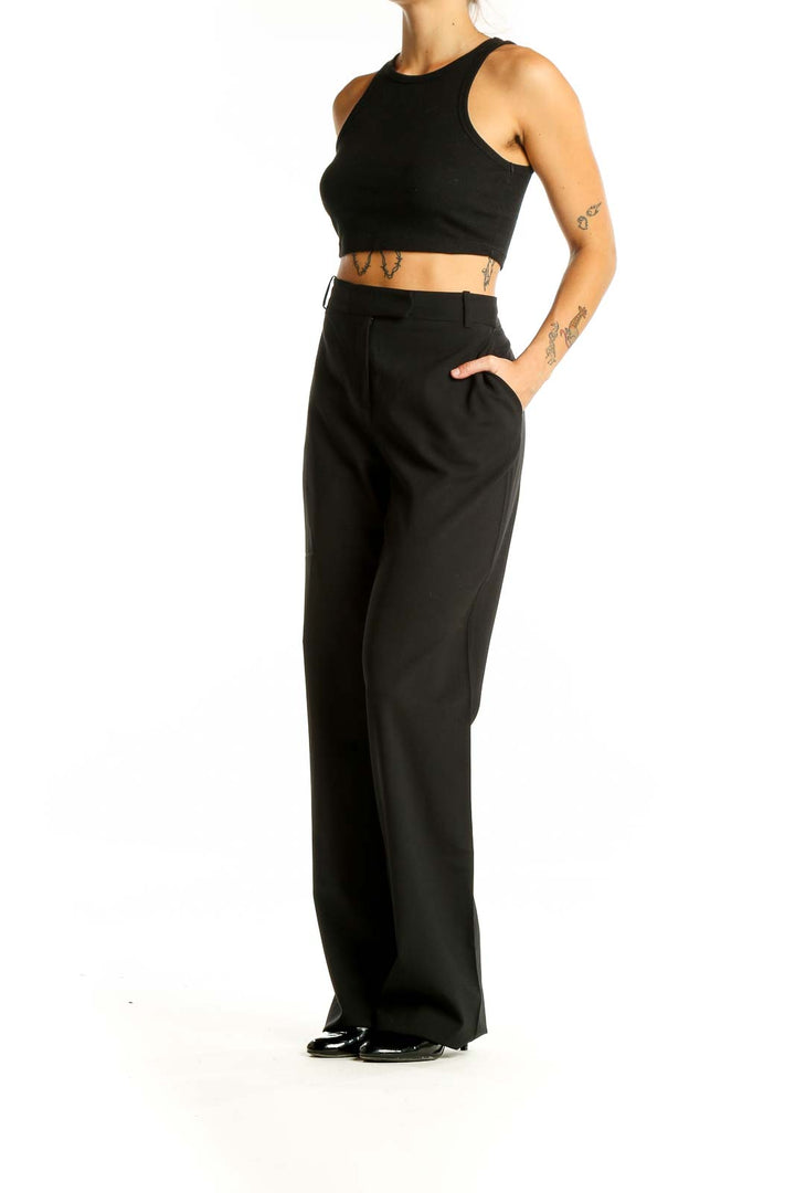 Front view of Diane von Furstenberg black wide-leg trousers