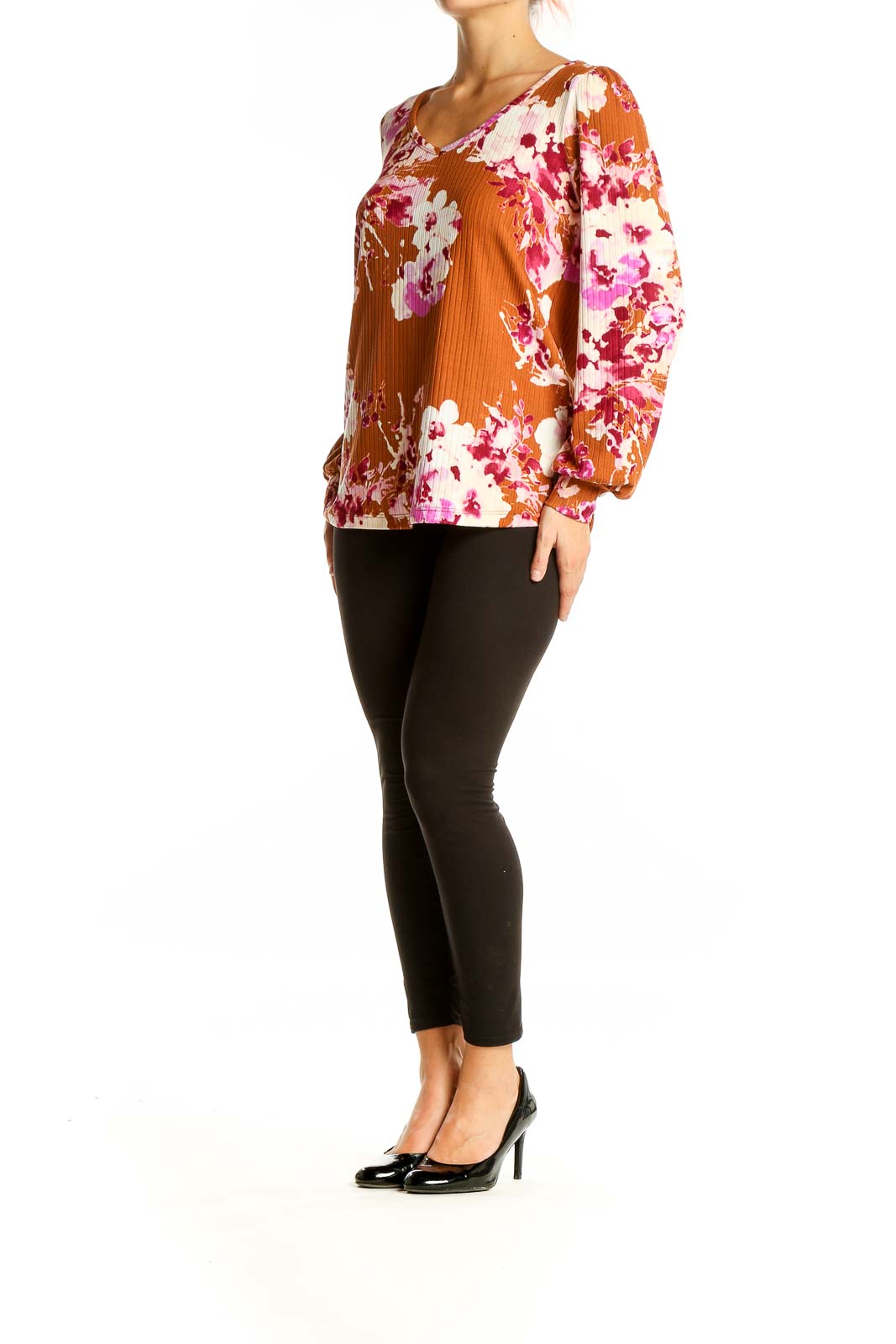 Front view of orange Staccato blouse with pink and white floral print and V-neckline