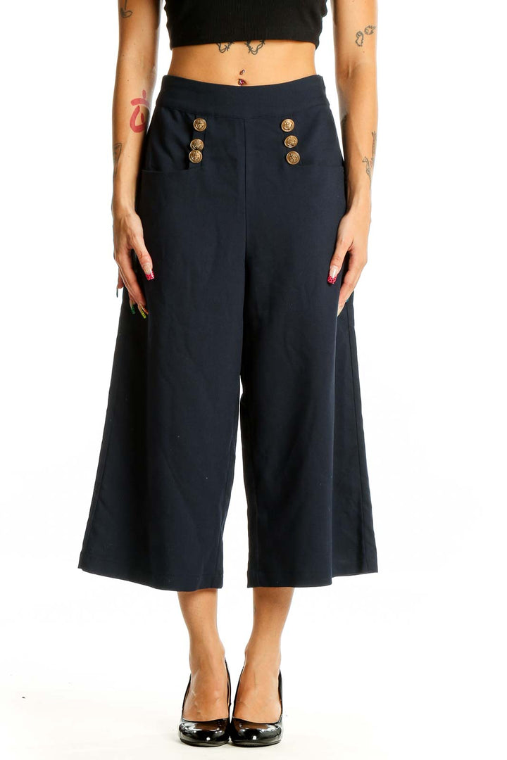 Front view of Unique Vintage navy wide-leg cropped trousers with gold button details