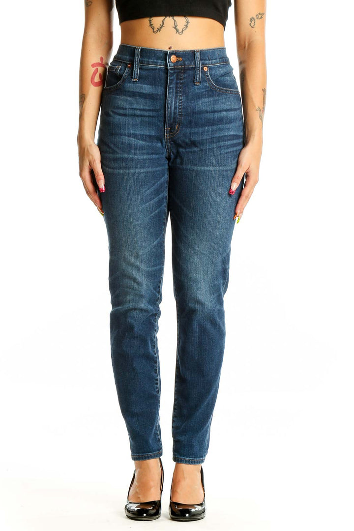 Front view of Madewell blue high-rise straight-leg jeans on model