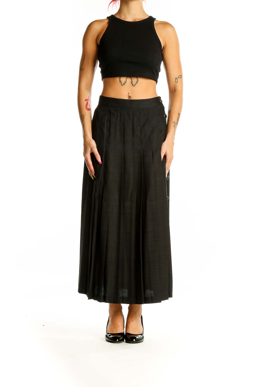 Front view of Pearl C black pleated silk midi skirt on model