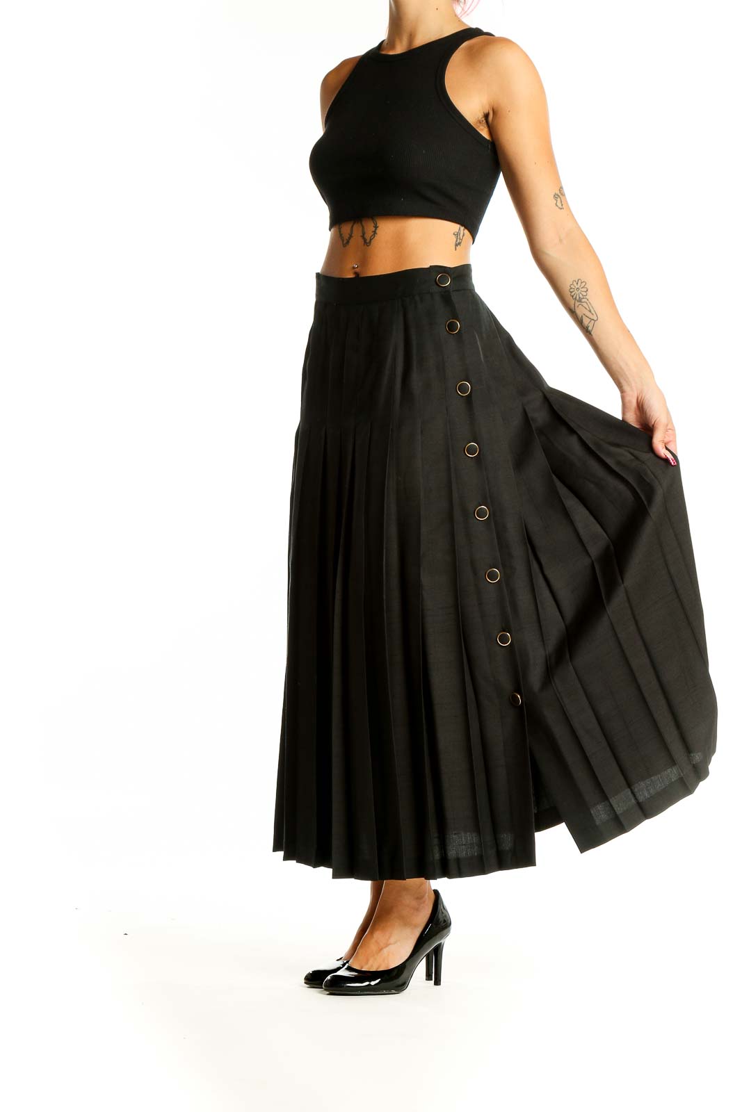 Front view of Pearl C black pleated silk midi skirt on model