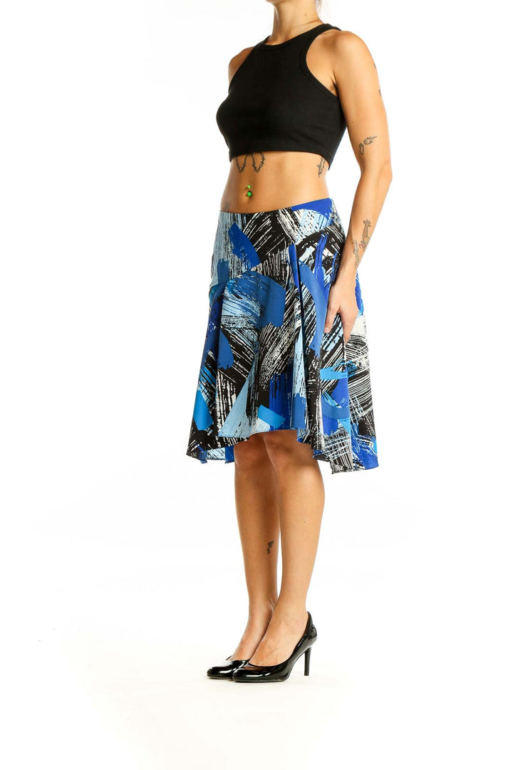 Front view of Vince Camuto blue abstract print high-low skirt