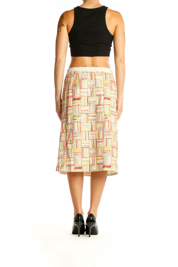 Back view of Piazza Sempione multicolor patchwork A-line midi skirt