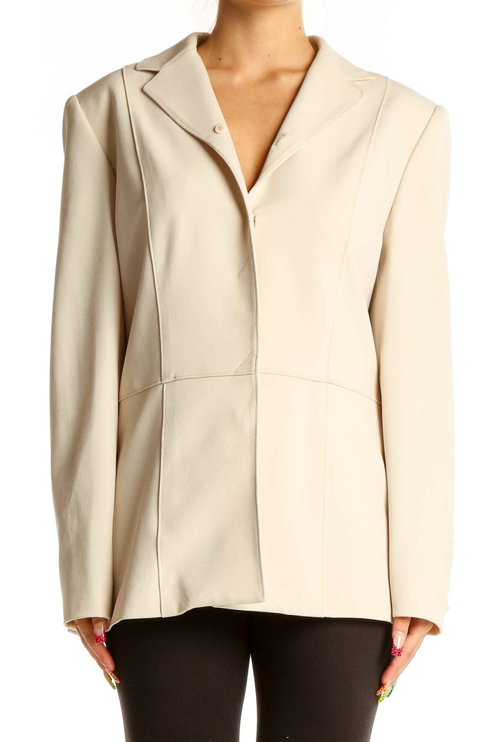 Front view of Halston cream structured blazer jacket