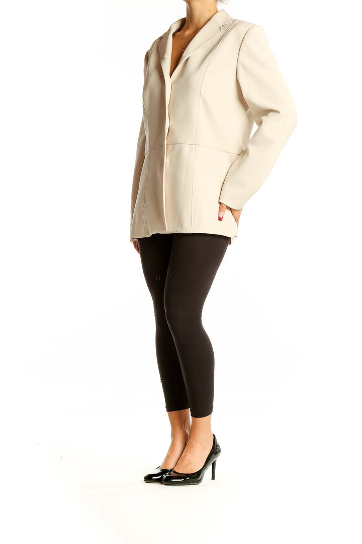 Front view of Halston cream structured blazer jacket