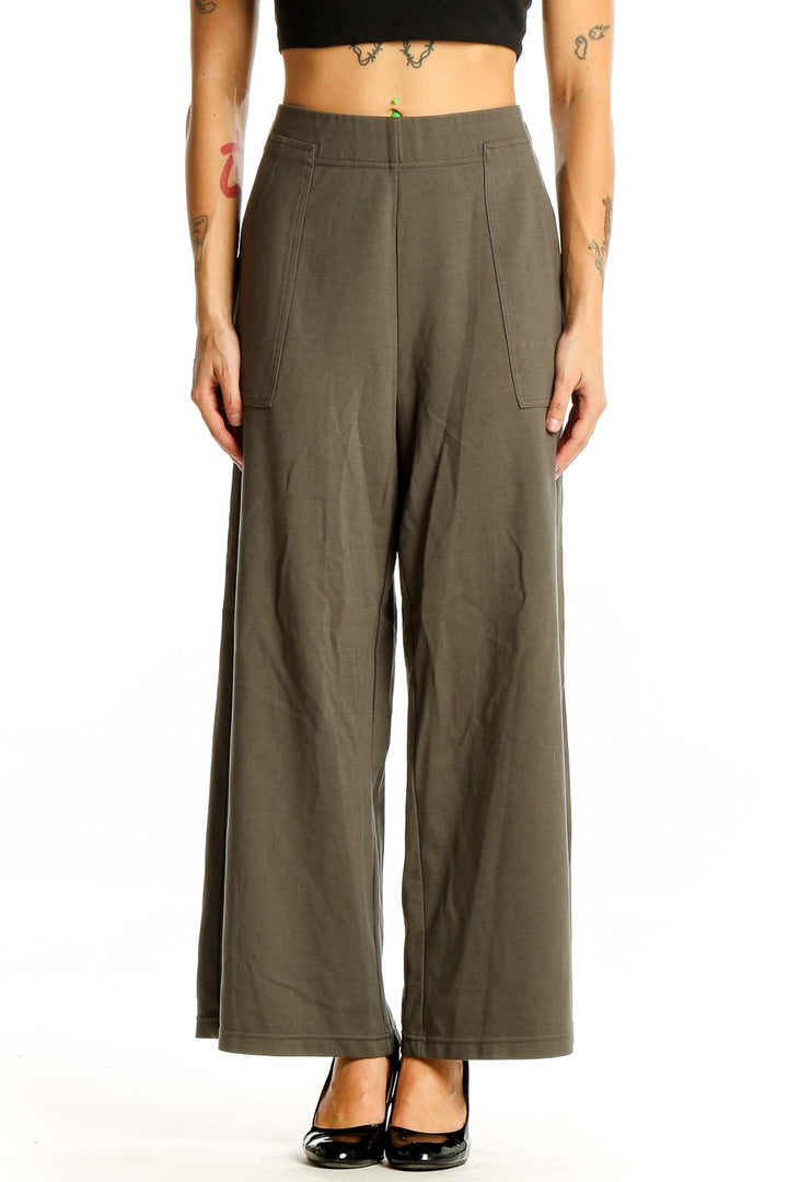 Front view of Max Studio olive wide-leg pants with high waist and front pockets