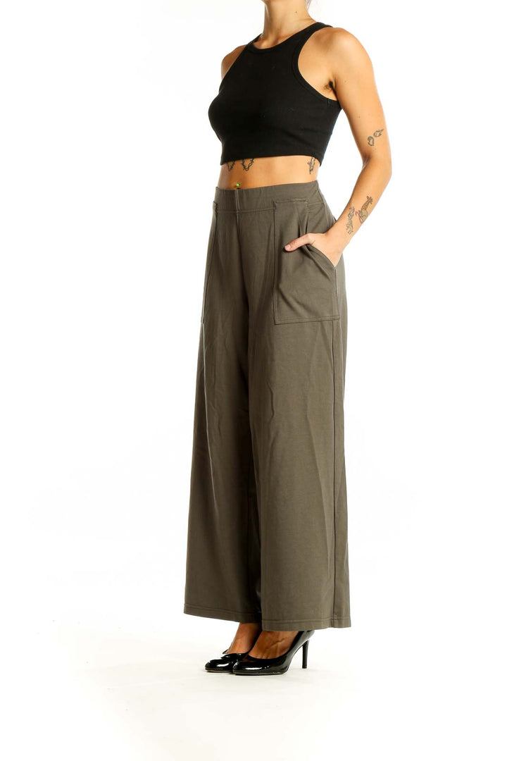 Front view of Max Studio olive wide-leg pants with high waist and front pockets