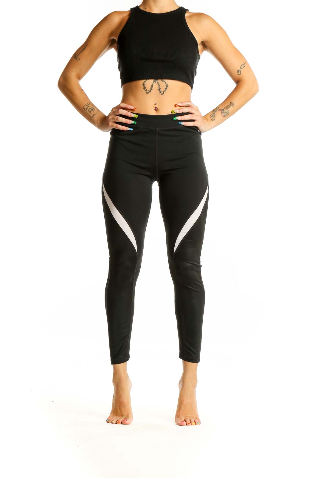 Front view of black GapFit high-waisted leggings with white side panels