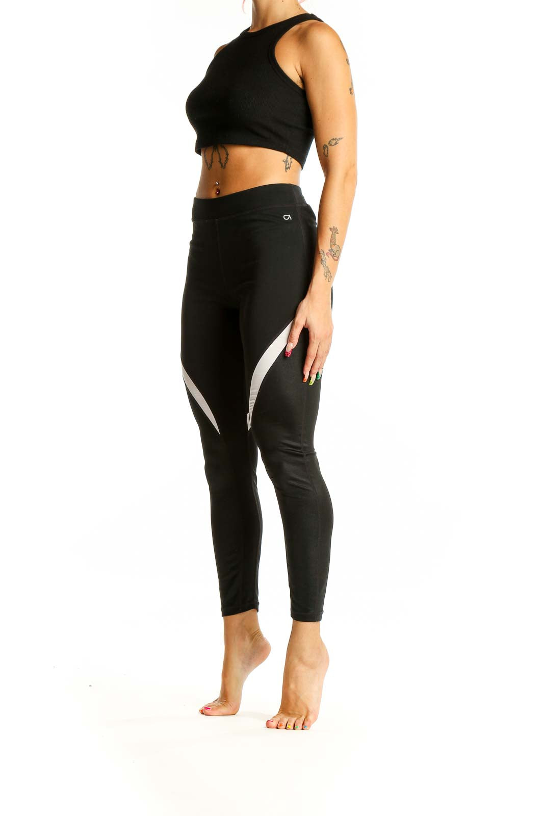 Front view of black GapFit high-waisted leggings with white side panels