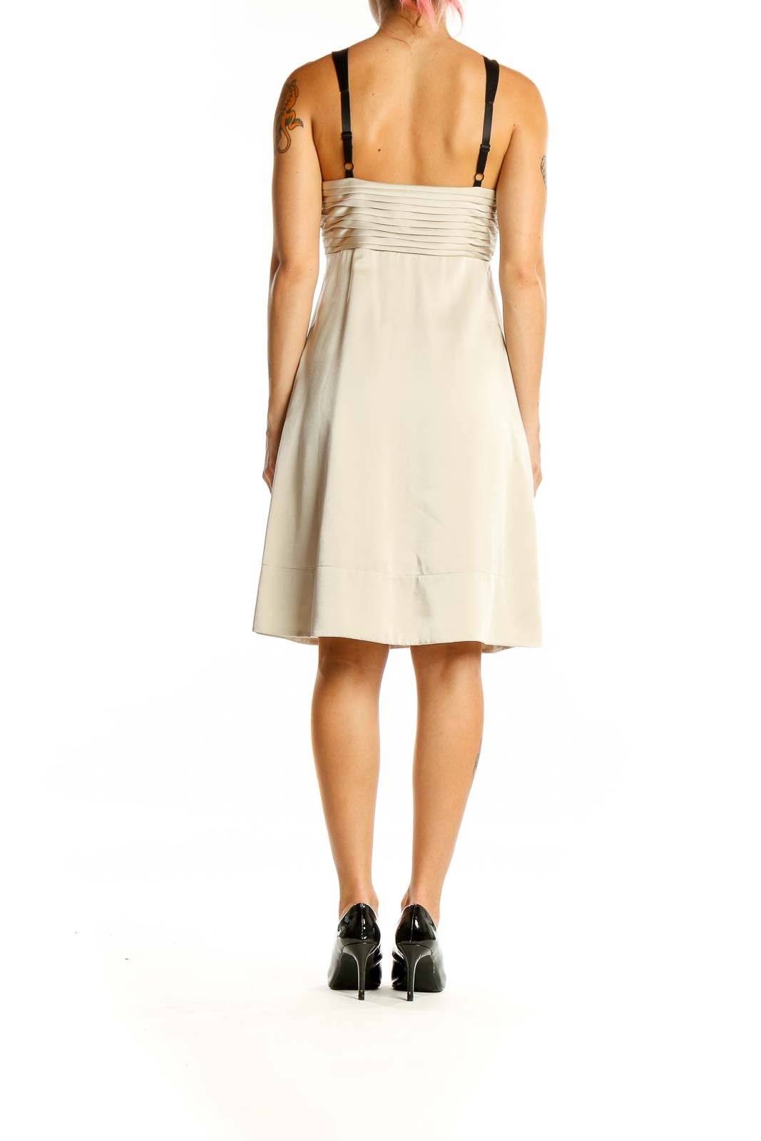 Back view of cream BCBG MaxAzria cocktail dress showing ruched detail