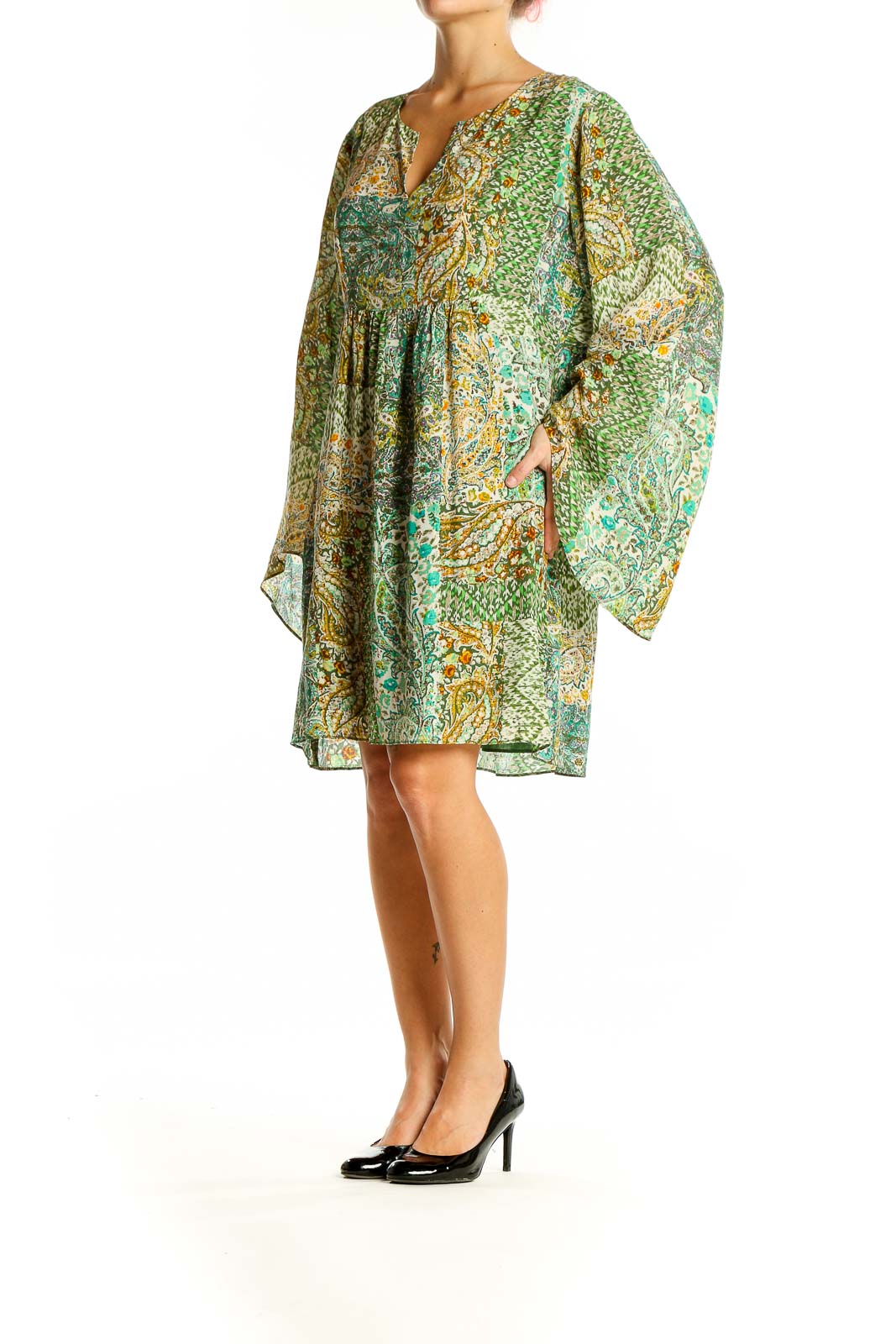 Front view of green paisley silk tunic dress with bell sleeves