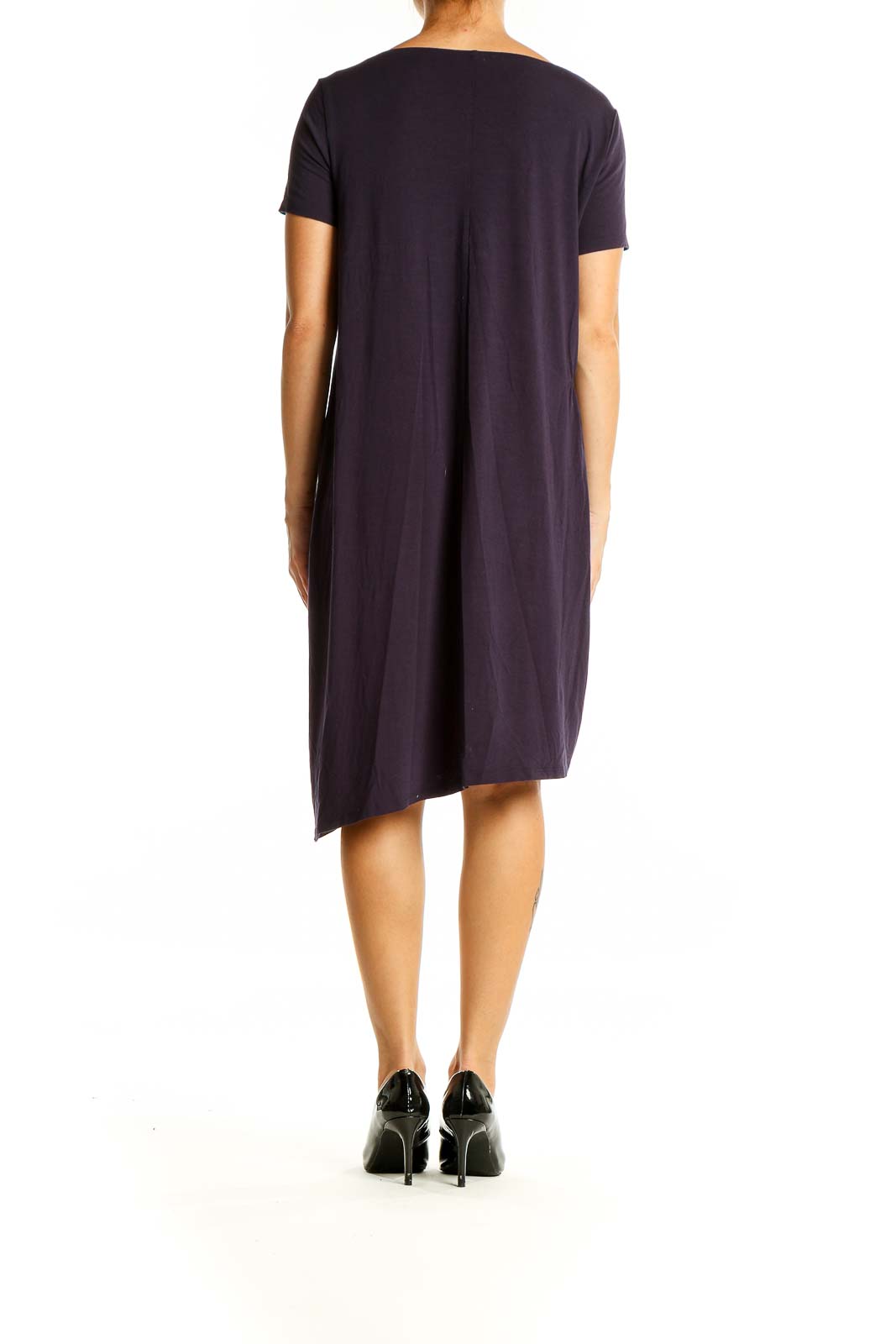 Back view of Eileen Fisher navy asymmetrical T-shirt dress showing asymmetrical hemline