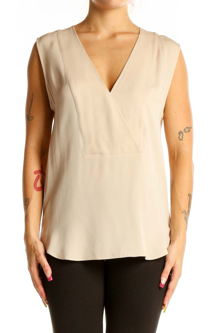 Front view of Theory beige sleeveless silk blouse with V-neck