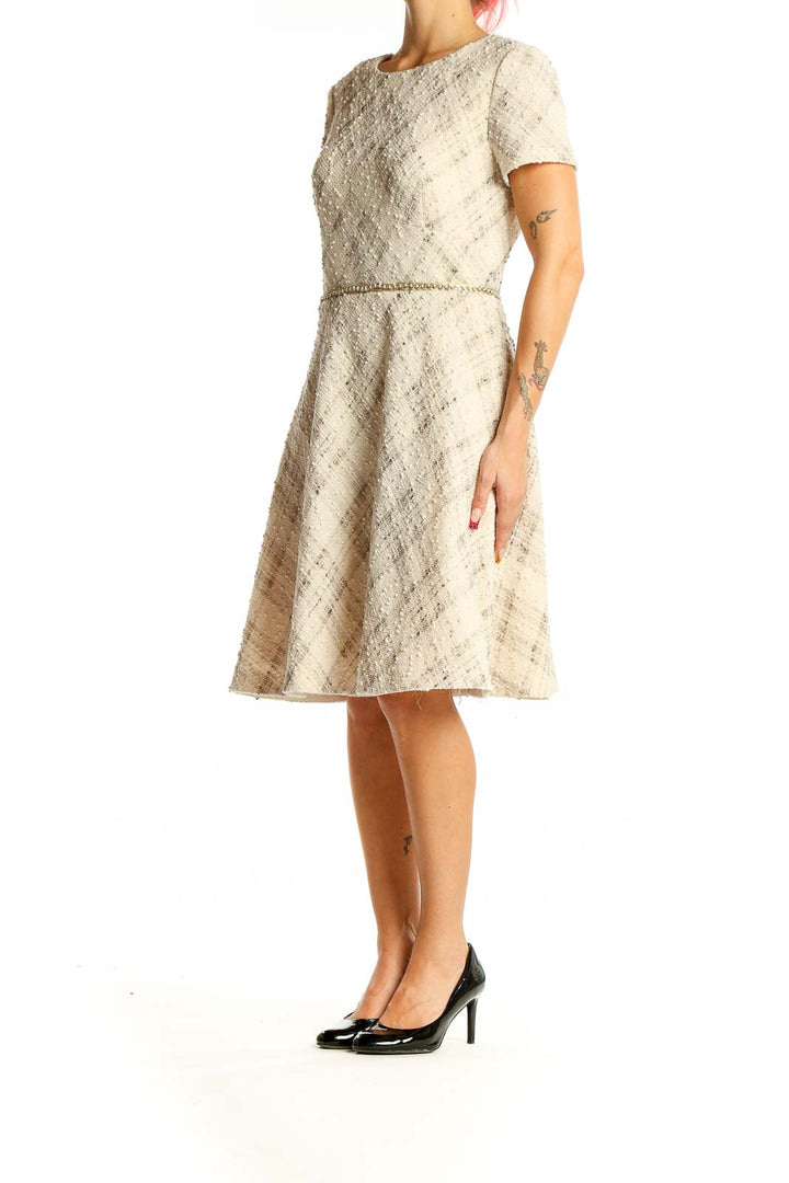 Front view of cream textured A-line cocktail dress by Tahari Arthur S. Levine