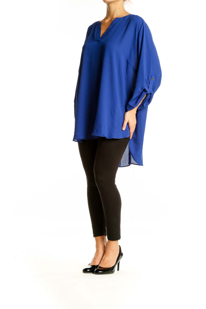 Front view of Vince Camuto royal blue V-neck tunic top