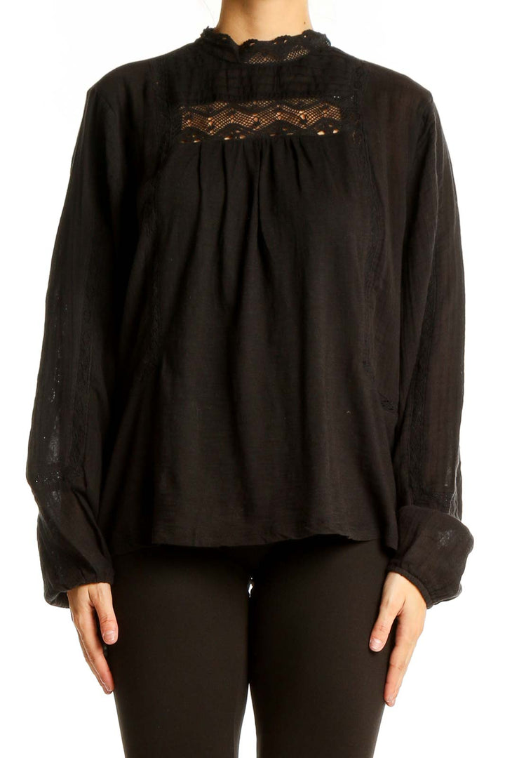 Front view of black Lucky Brand cotton blouse with lace trim and long sleeves