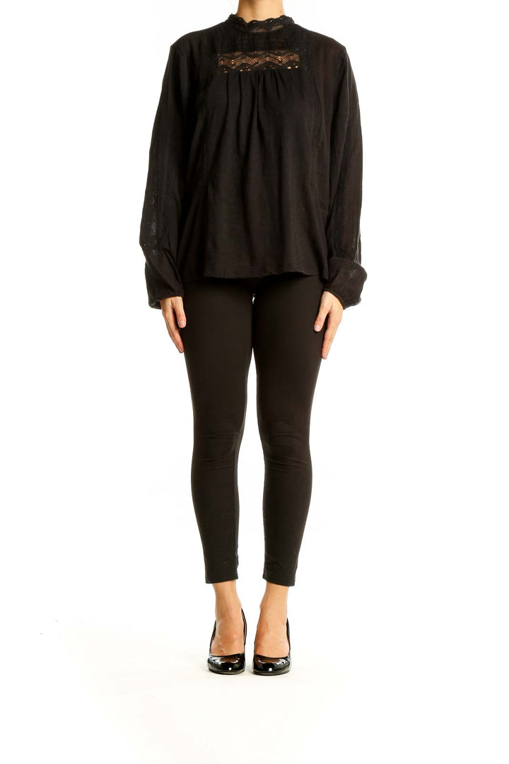 Front view of black Lucky Brand cotton blouse with lace trim and long sleeves