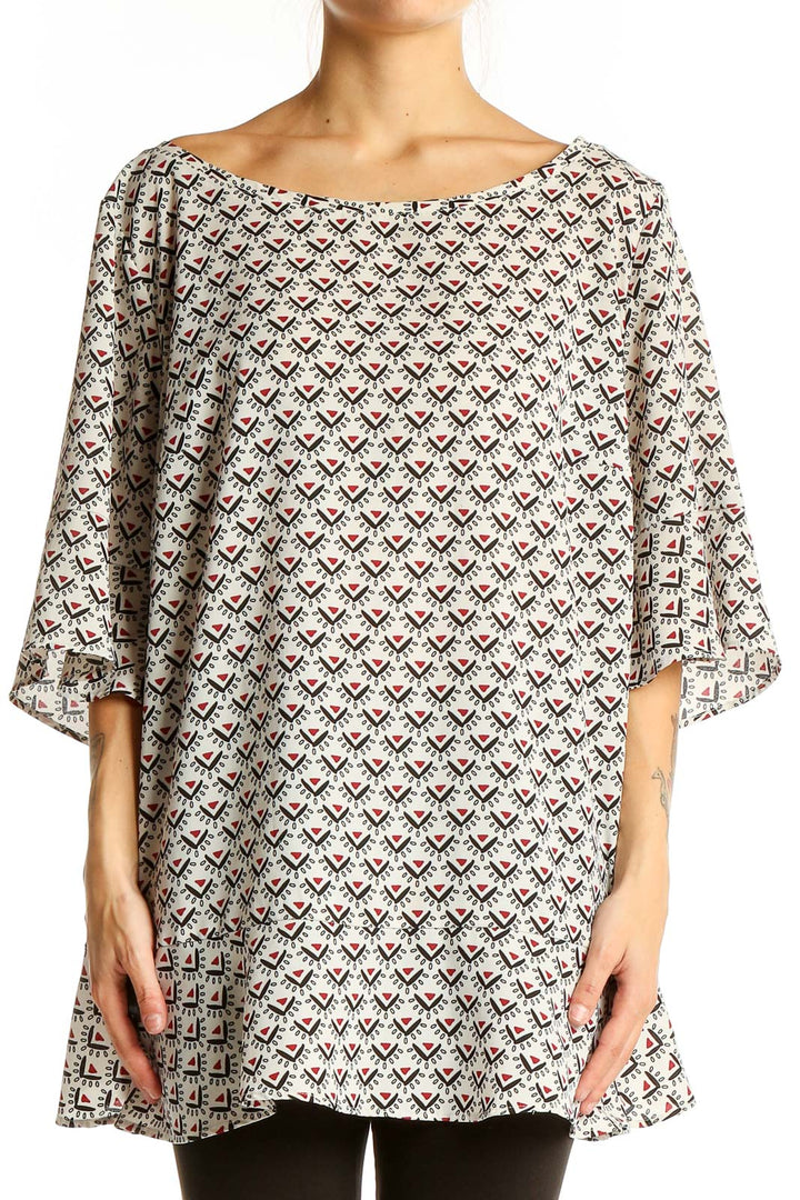 Front view of LOFT white tunic top with black and red geometric print