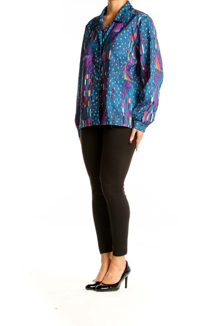 Front view of SilkRoll blue multicolor abstract print button-up blouse