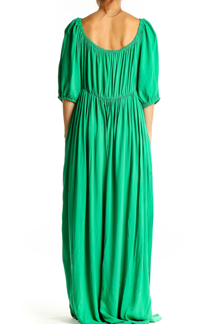 Back view of Eloquii green rayon maxi dress showing flowy silhouette