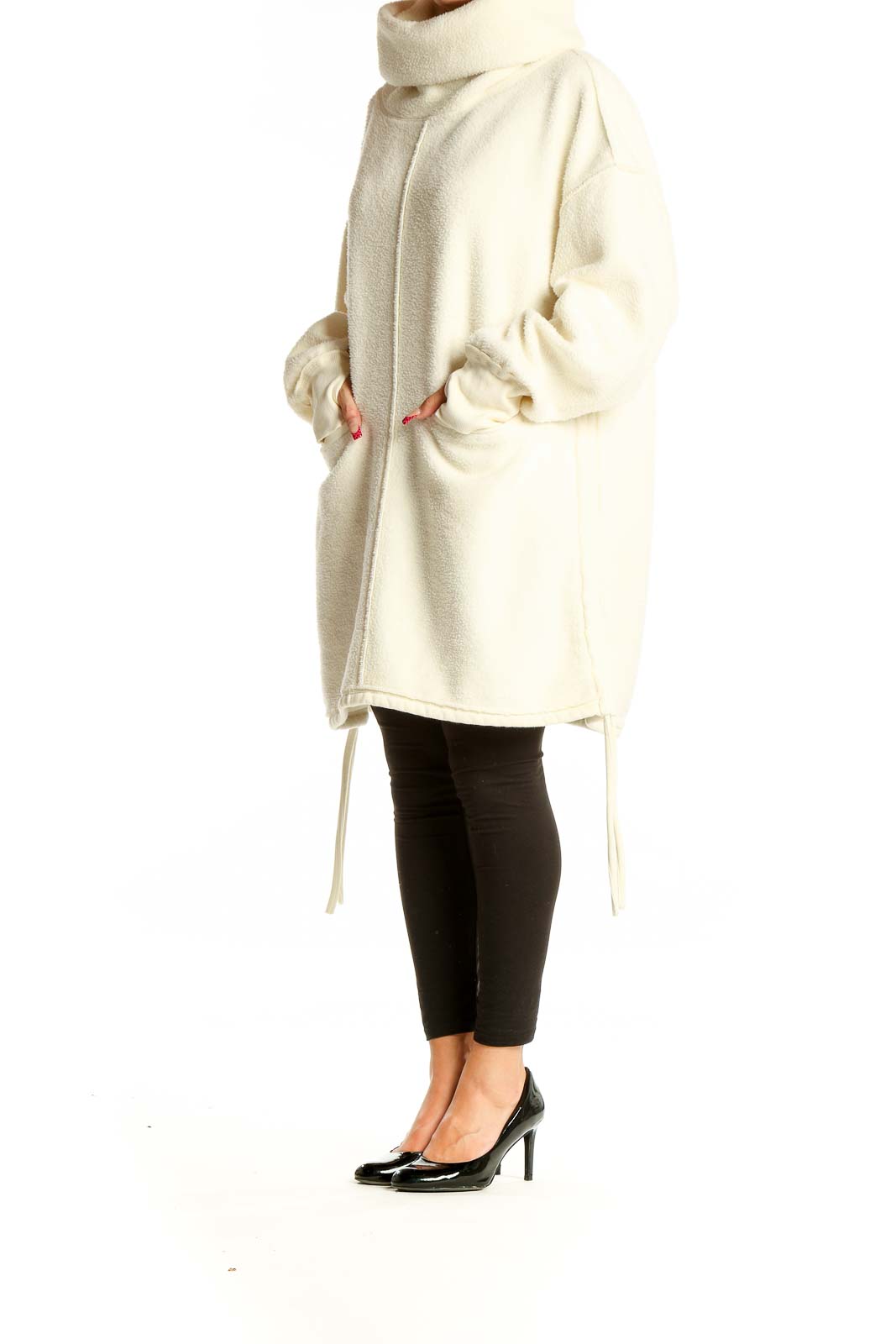 Front view of cream oversized fleece turtleneck jacket from WE THE FREE