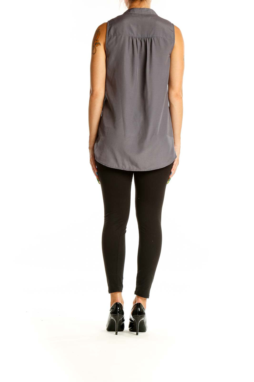 Back view of gray sleeveless J.Crew blouse showing relaxed fit and longer length