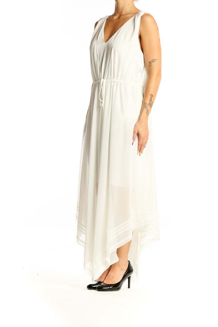 Front view of All Saints white flowy V-neck maxi dress with gathered waist