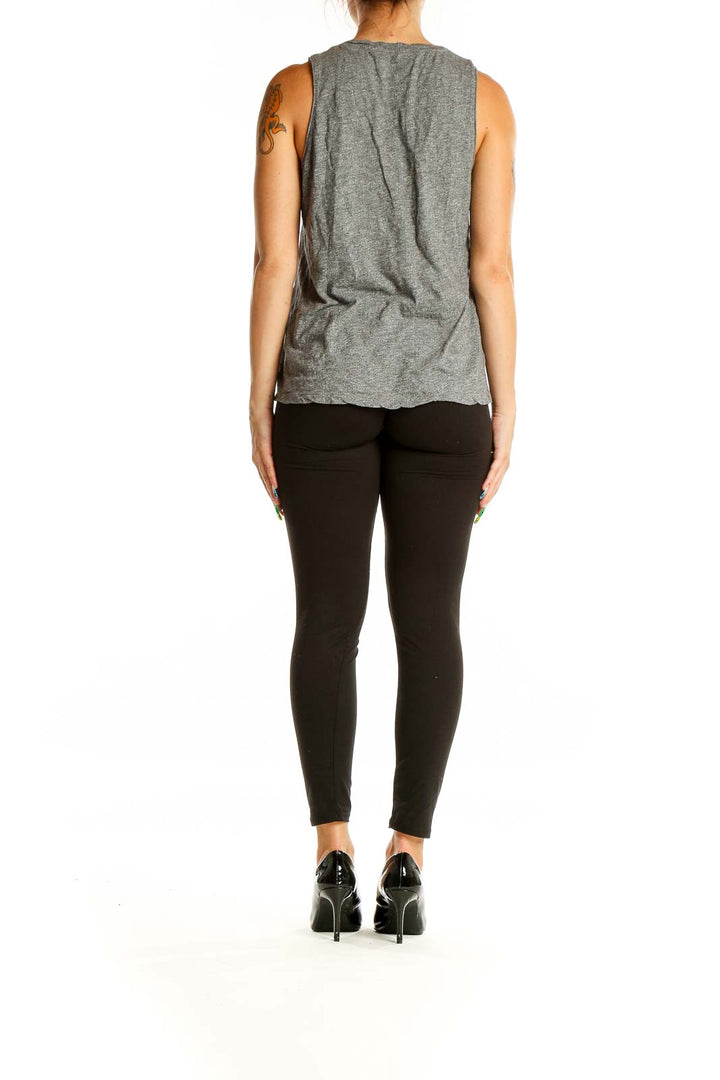 Back view of Madewell gray cotton tank top on model with black pants