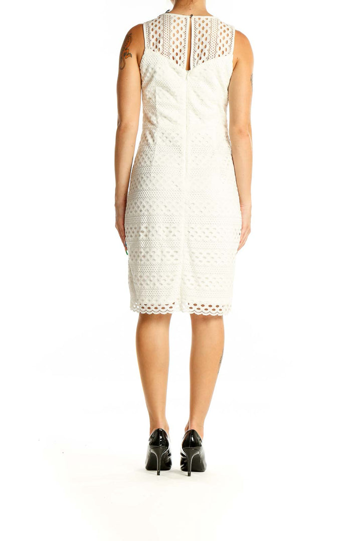 Back view of Guess white lace sleeveless cocktail dress showing hidden zipper