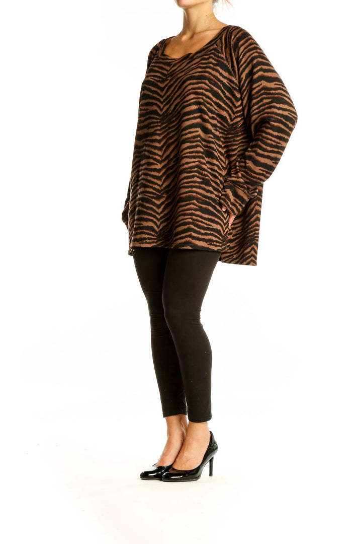 Front view of Sanctuary brown tiger stripe oversized knit sweater