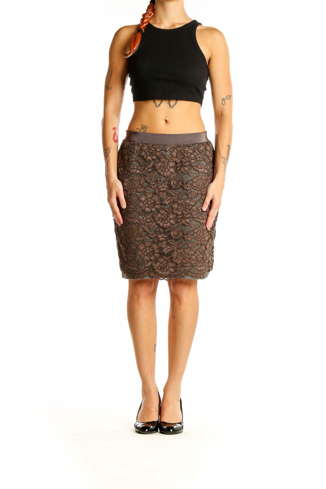 Front view of brown lace pencil skirt by LOFT with floral overlay