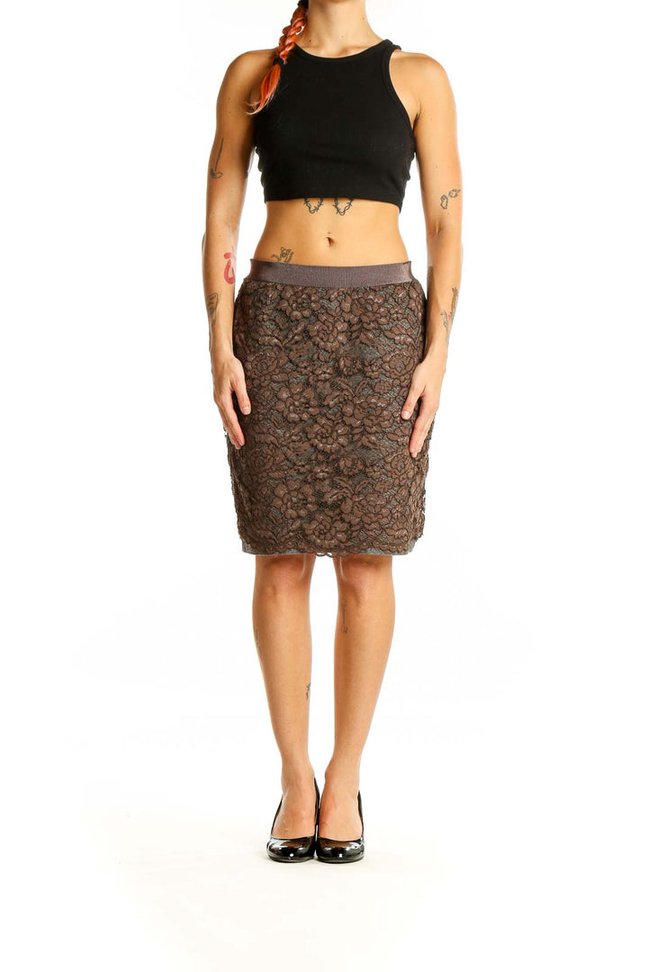 Front view of brown lace pencil skirt by LOFT with floral overlay