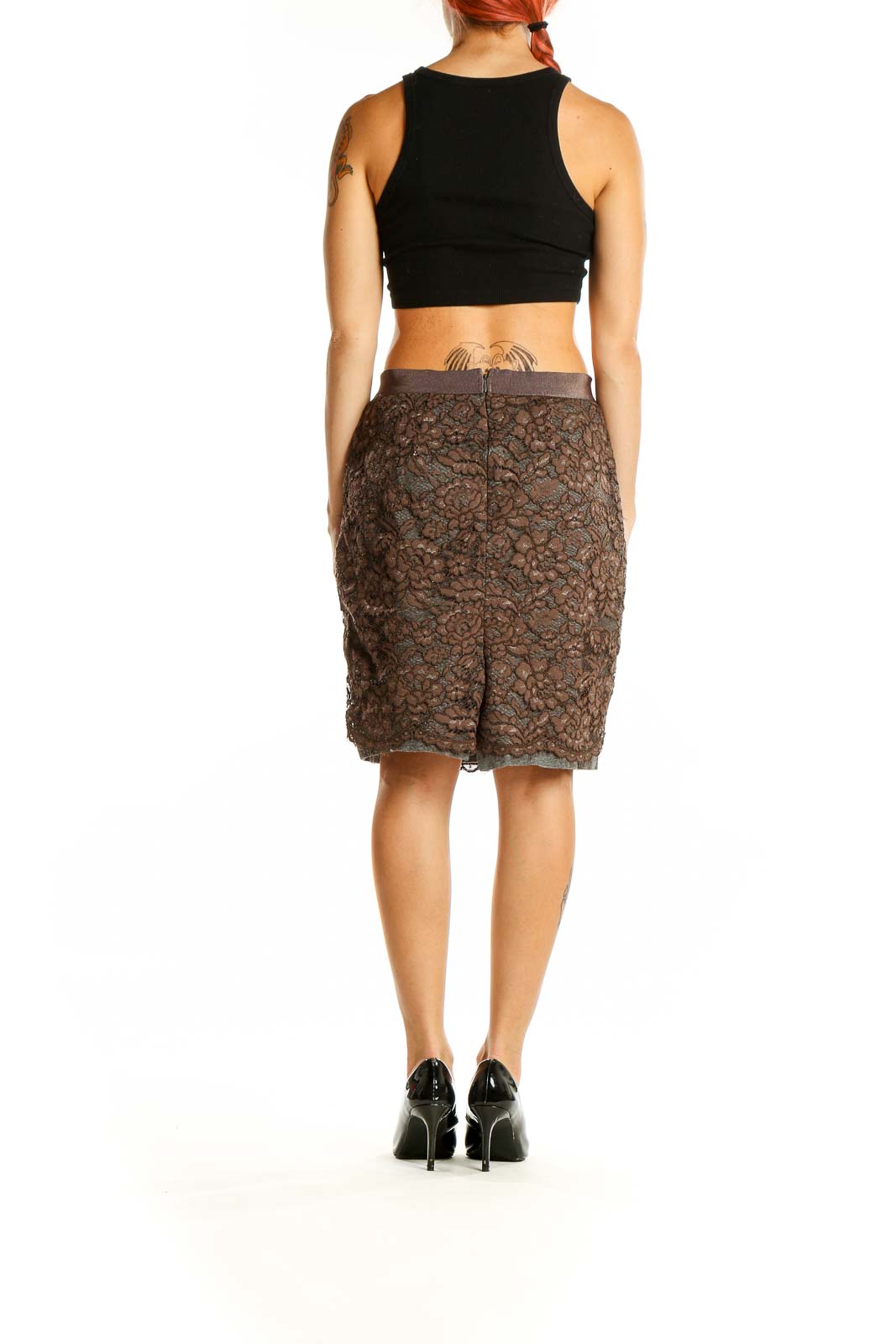 Back view of brown lace pencil skirt by LOFT showing fitted silhouette