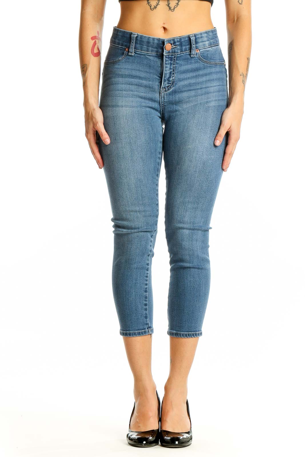 Front view of Juicy Couture blue cropped skinny jeans on model