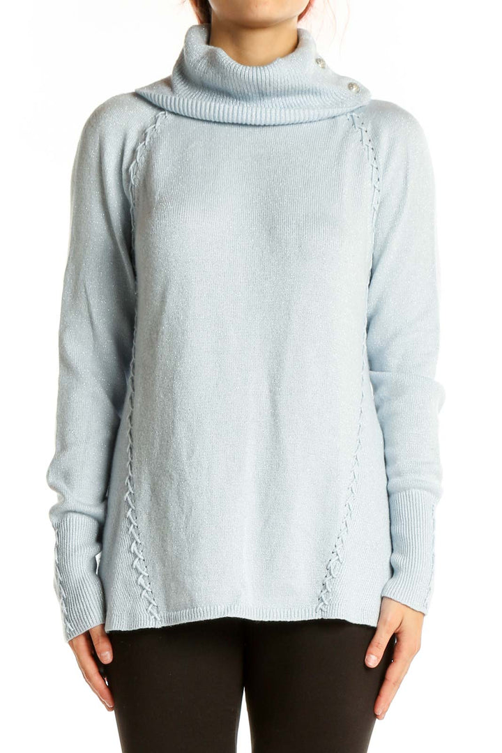 Front view of light blue turtleneck sweater with braided side details