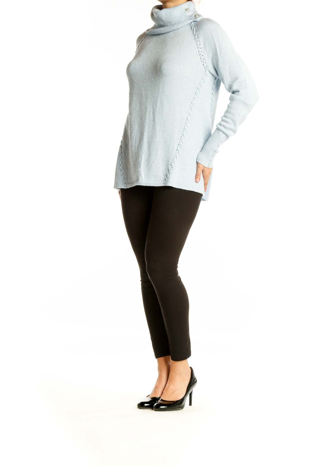 Front view of light blue turtleneck sweater with braided side details