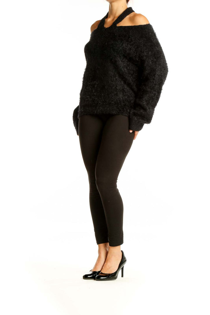 Front view of black fuzzy cold-shoulder halter sweater from Express