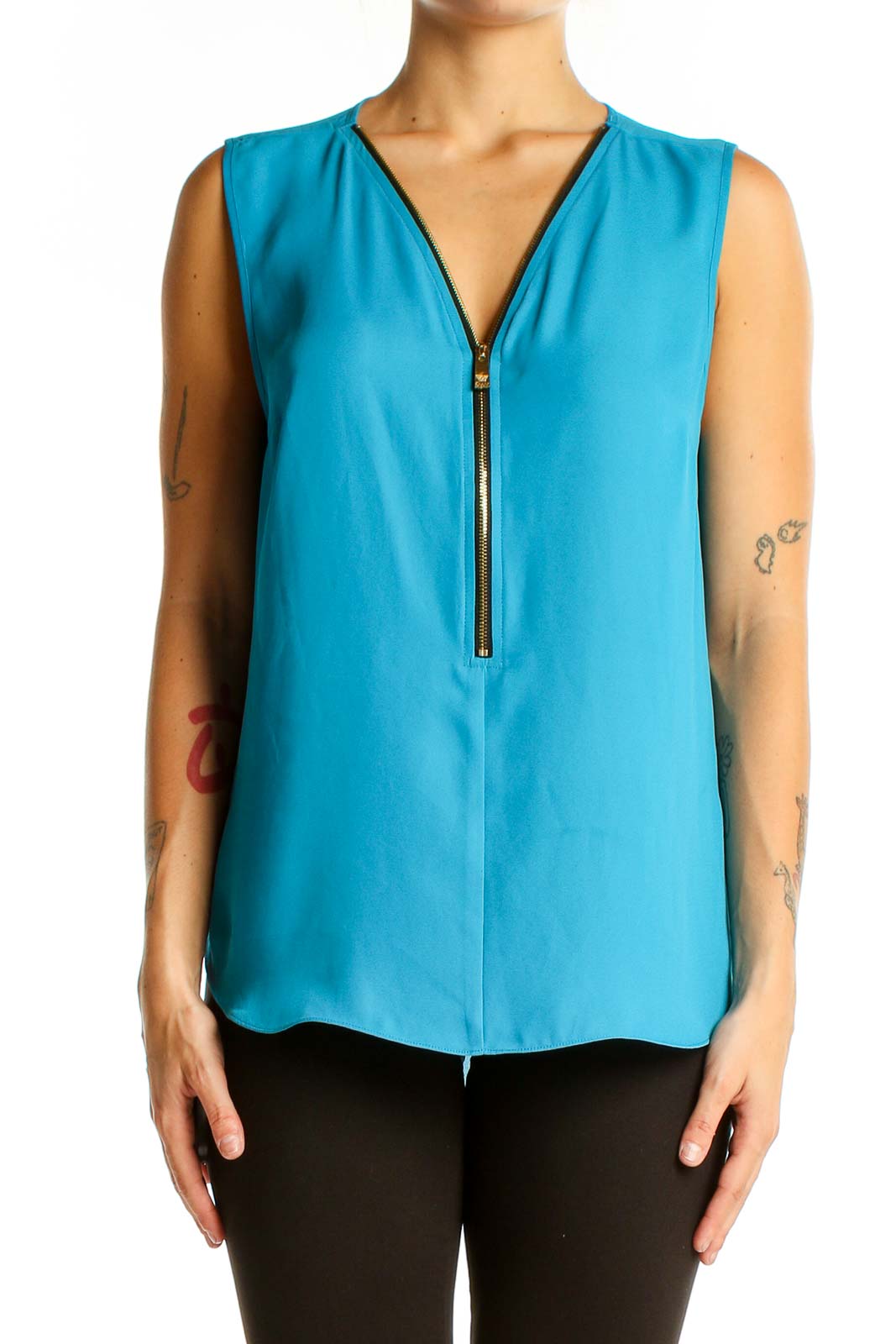 Front view of turquoise sleeveless blouse with zip-front detail